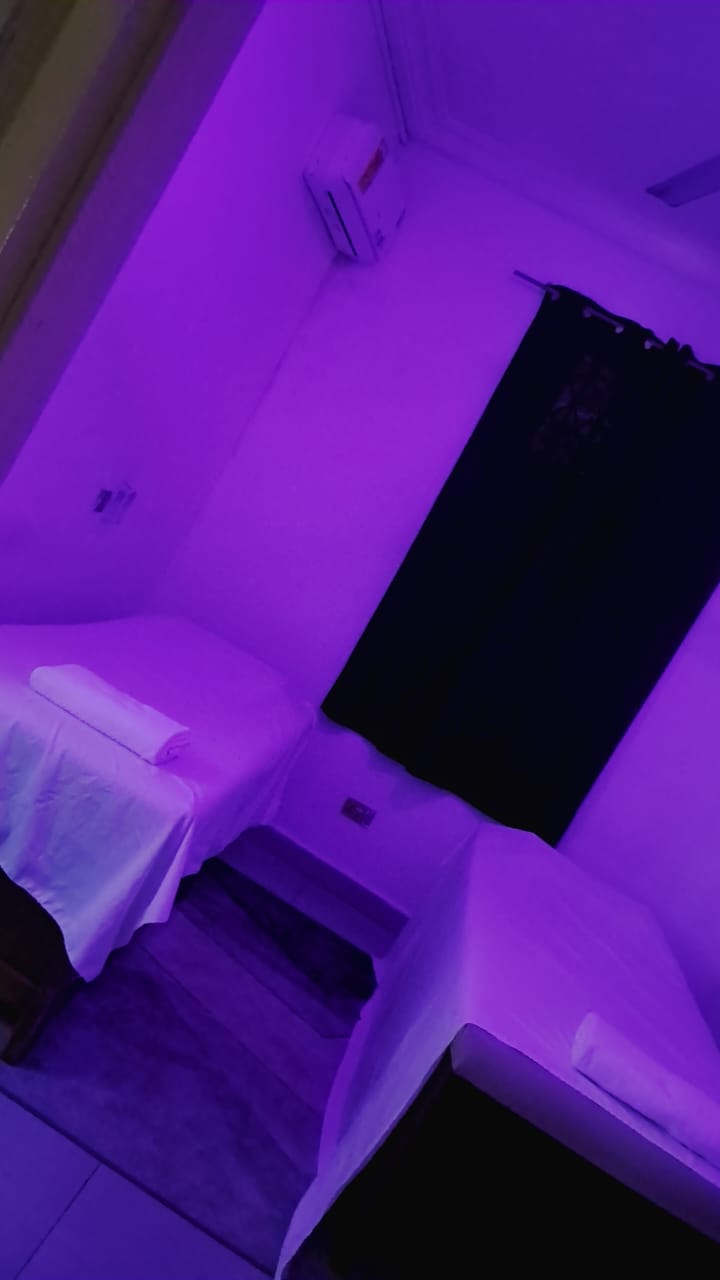 Massage therapy room with ambient lighting
